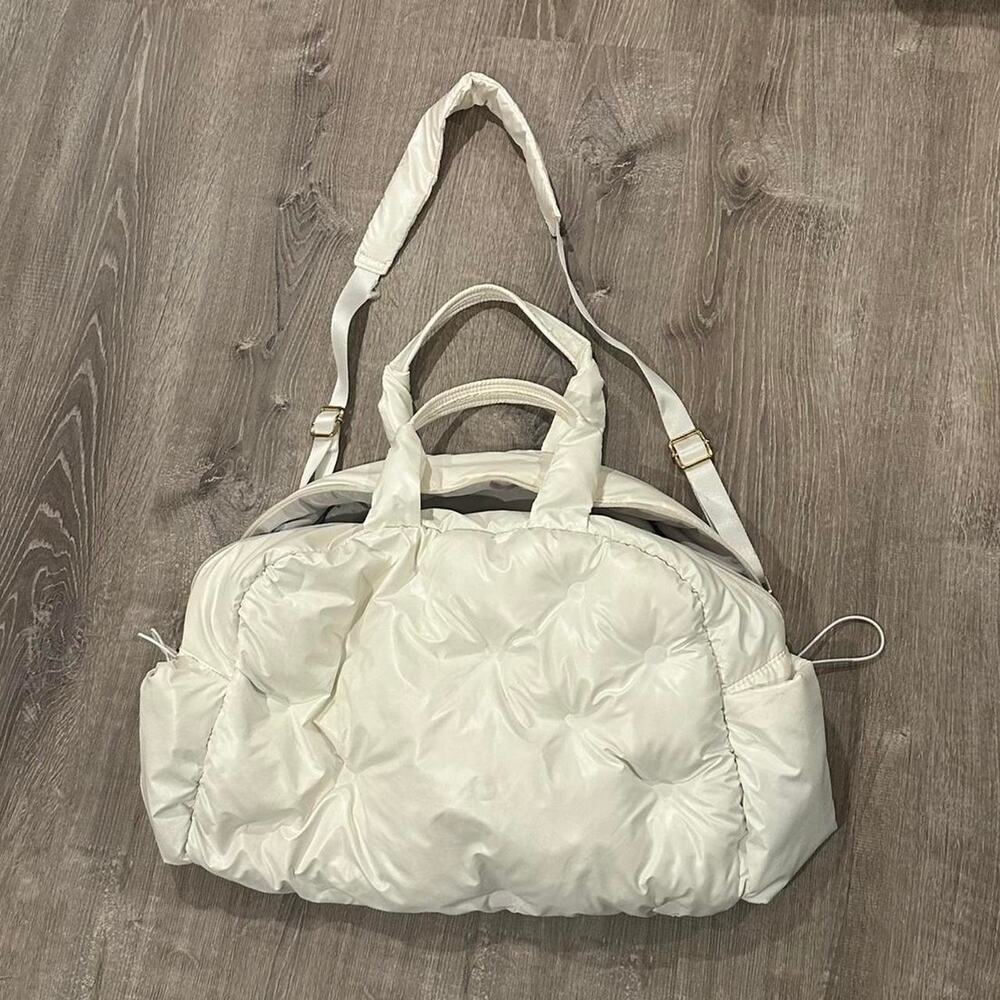 White puffy nylon bag